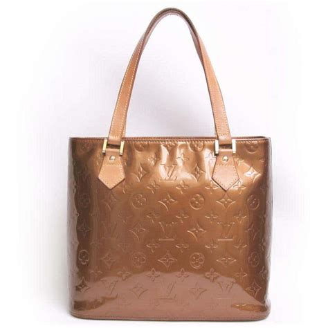 are louis vuitton handbags made of leather|louis vuitton shiny leather bag.